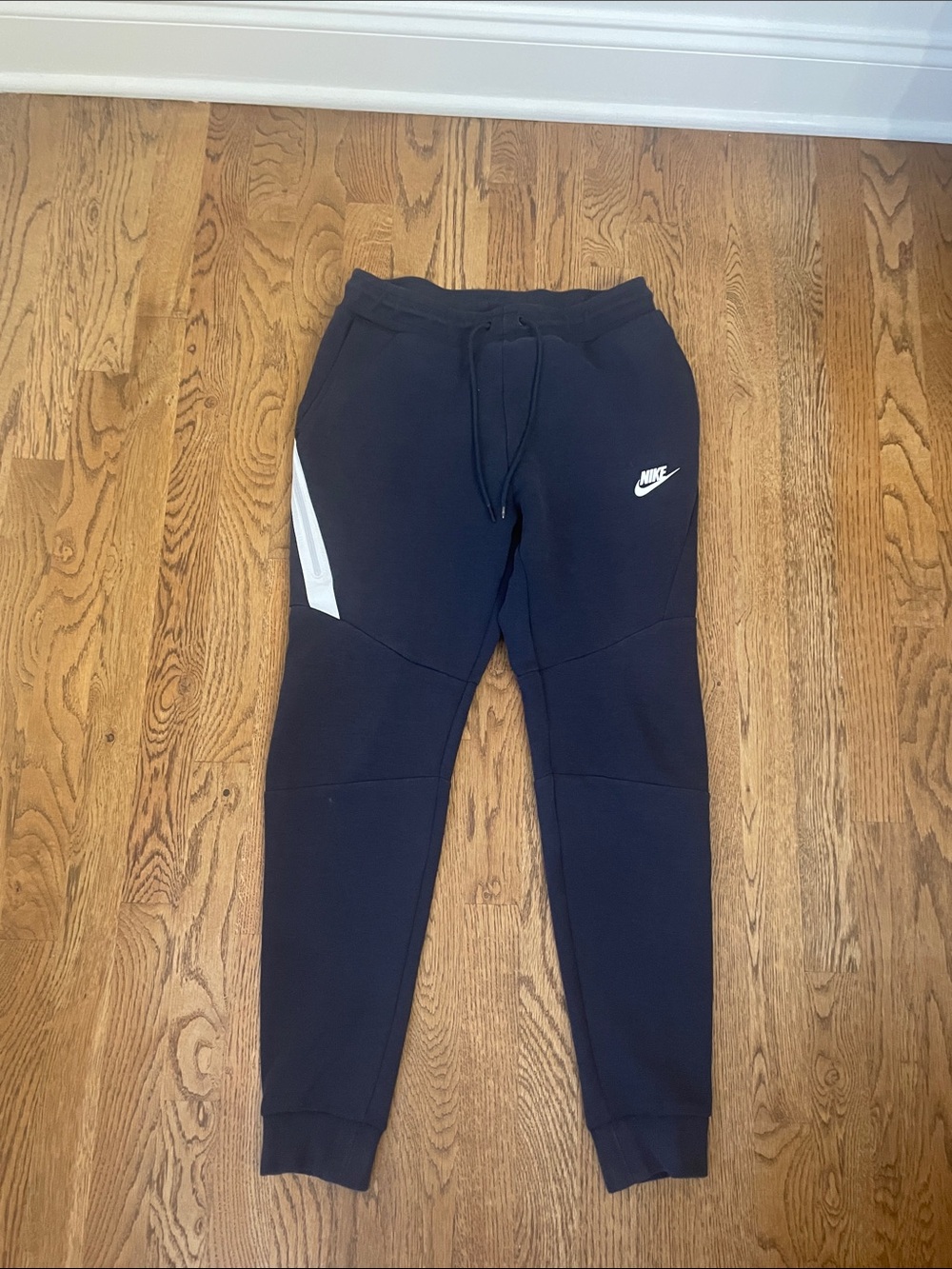Nike Navy Joggers with White Swoosh and Side Panel